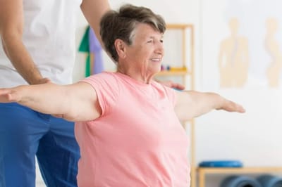 Senior woman engaged in physical therapy exercise