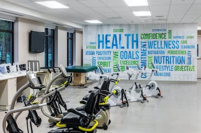 Fitness equipment in a wellness area with motivational words