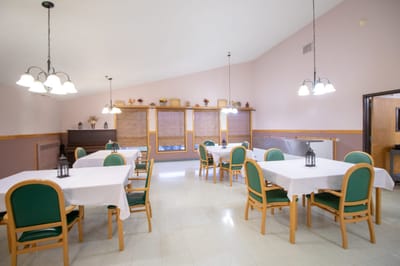 Bright dining room with tables and chairs