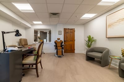 Bright interior space with seating and workspace areas