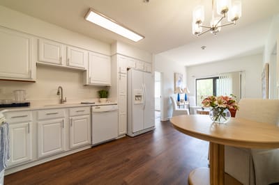 Bright and airy common kitchen area with dining table