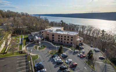 Aerial view of the facility next to the river