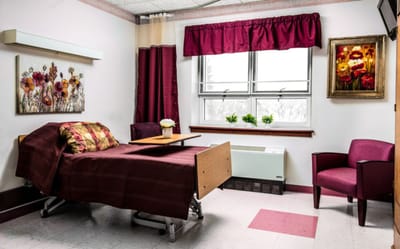 Cozy private room with bed and seating