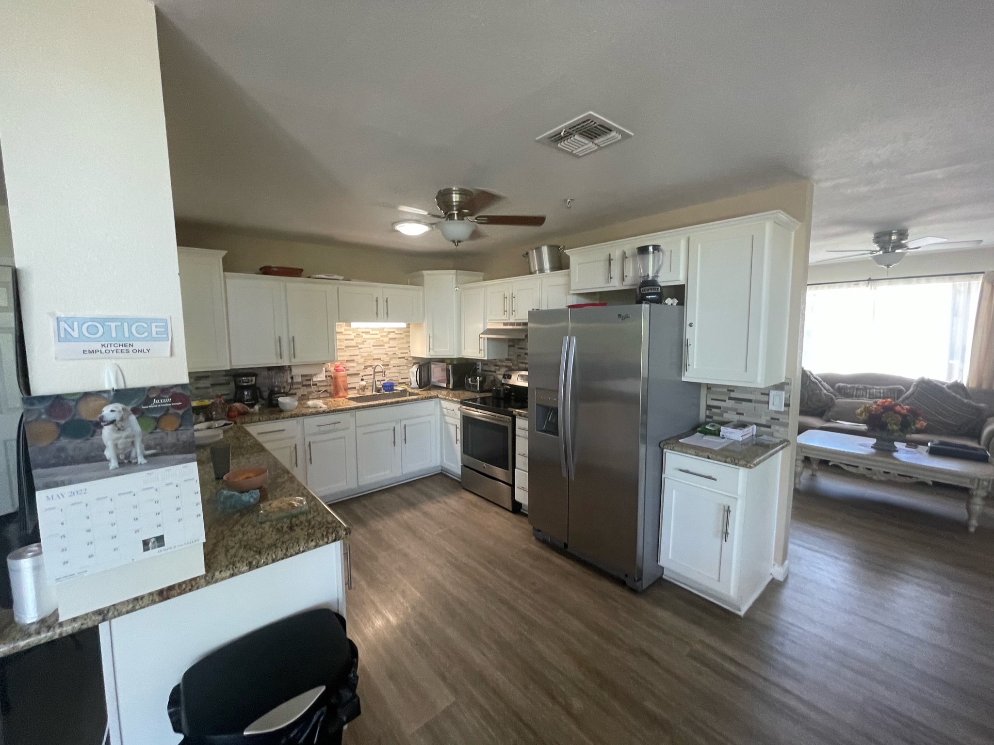 Bright kitchen area with modern appliances