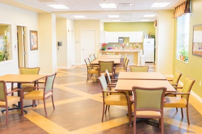 Bright dining room with tables and chairs