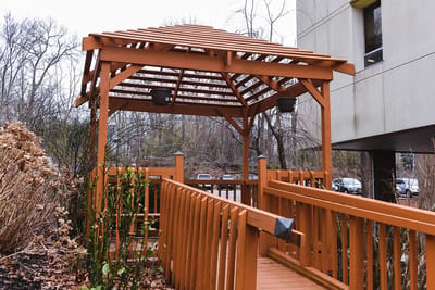 Wooden gazebo in an outdoor area of the facility