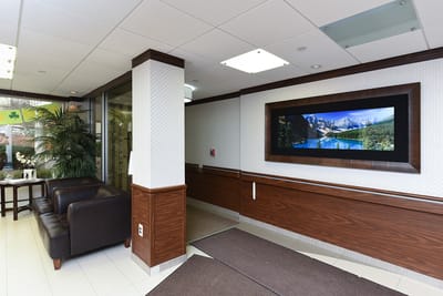 Bright lobby area with seating and artwork