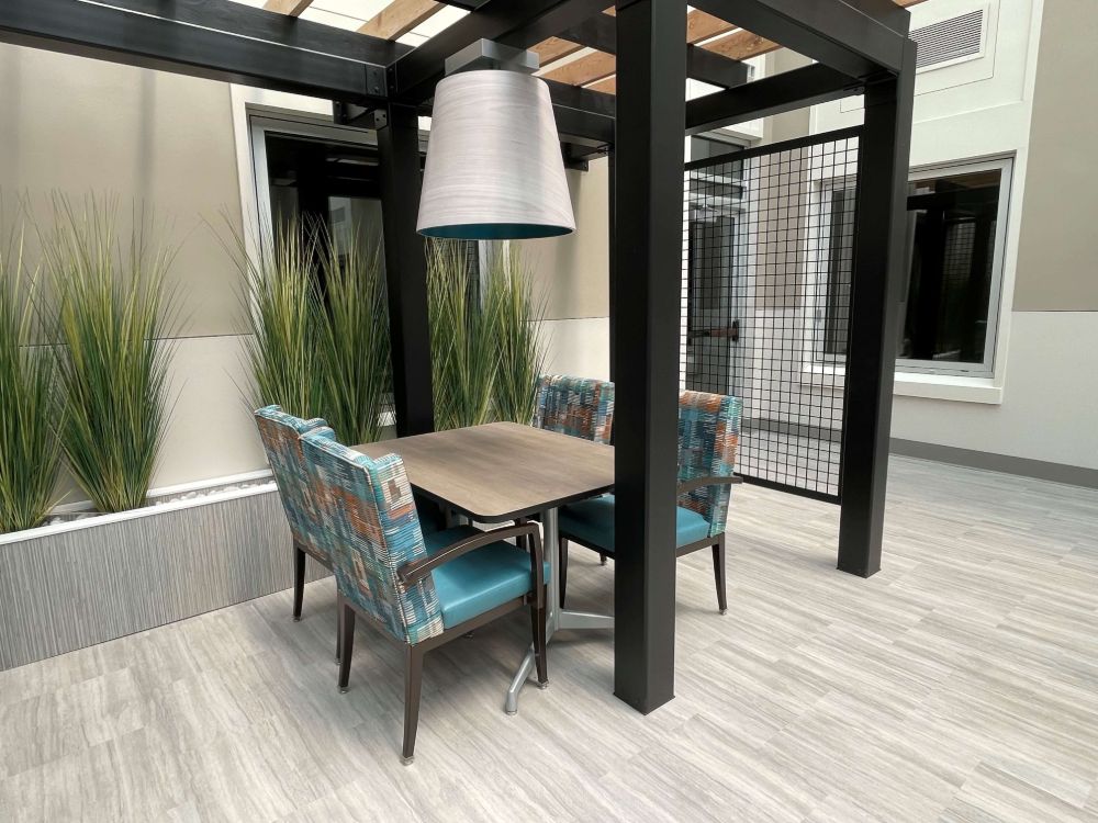 Interior seating area with colorful chairs