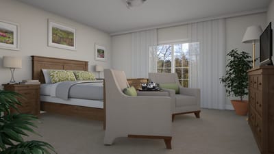 Cozy senior living bedroom with comfortable seating