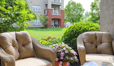 Cozy outdoor seating area overlooking a garden