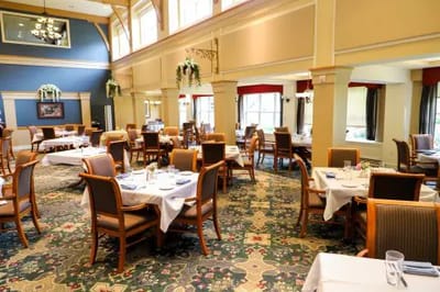 Dining area with tables set for a meal