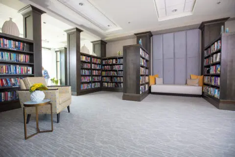 Cozy reading nook with bookshelves in a library