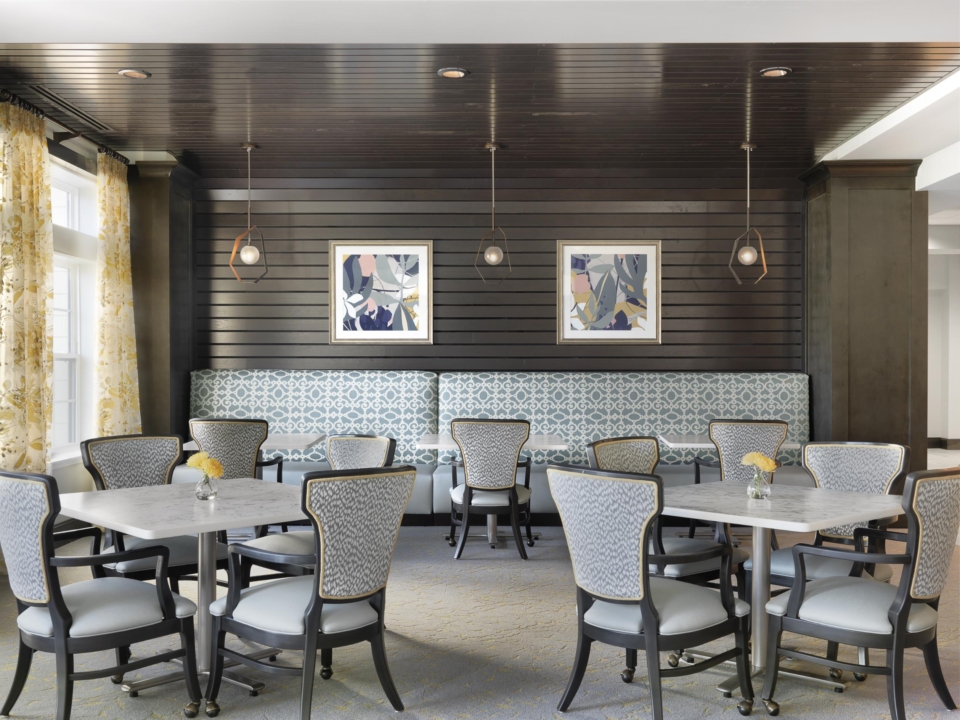 Bright dining area with seating and decor