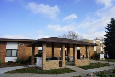 Exterior view of a senior living facility entrance