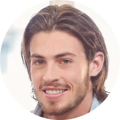 Smiling young man with long hair in a bright setting