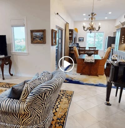 Bright common area with seating and dining space