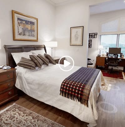 Cozy bedroom with a large bed and desk