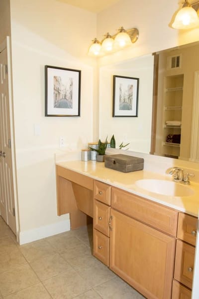 Well-lit bathroom with modern decor and fixtures