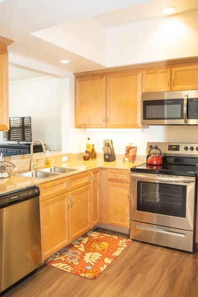 Bright kitchen area with modern appliances