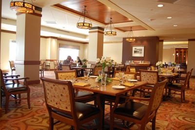 Dining area with tables set for a meal