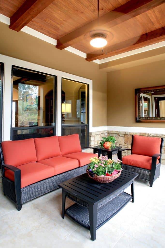 Outdoor seating area with comfortable furniture and plants