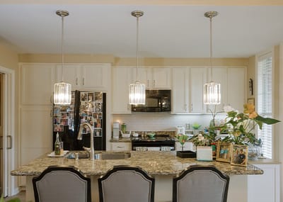 Bright kitchen area with modern appliances and decor