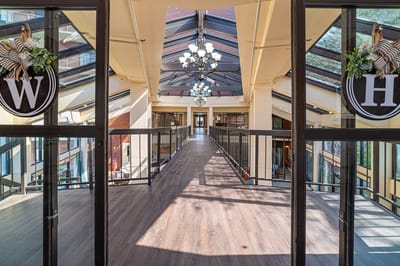 Bright interior corridor with elegant chandeliers