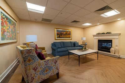 Cozy common area with comfortable seating and fireplace