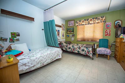 Cozy shared bedroom with personal decorations