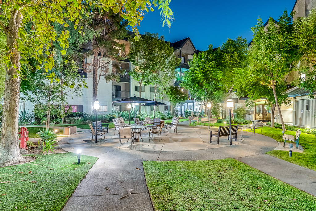 Outdoor garden area with seating and landscaping
