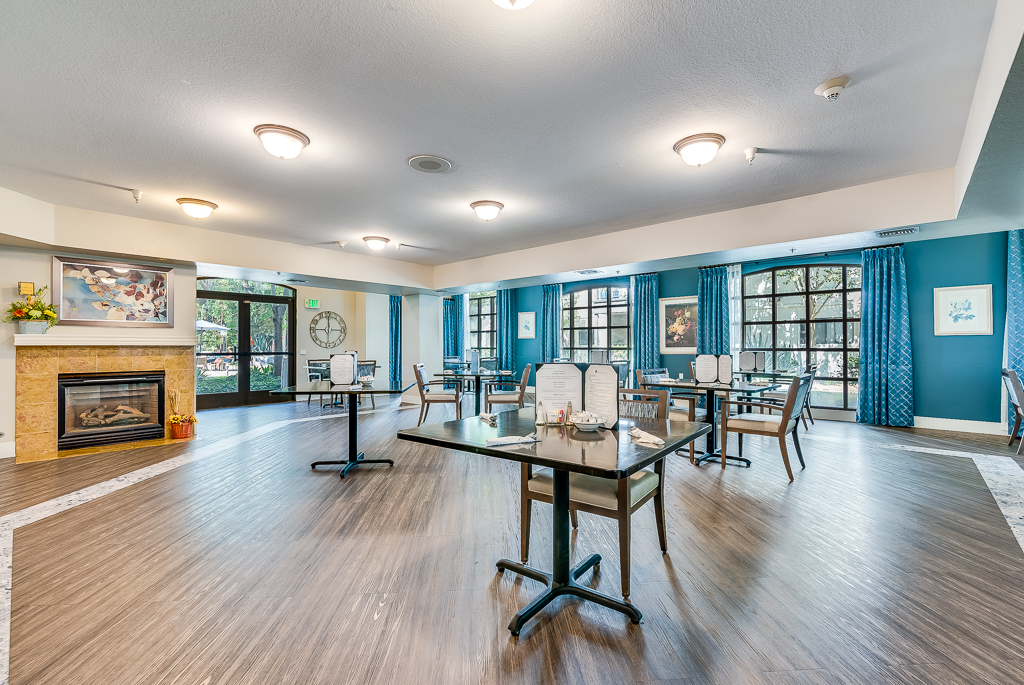 Bright dining room with tables and chairs