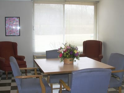 Interior common area with seating and flowers