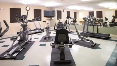Interior view of a fitness room with exercise equipment