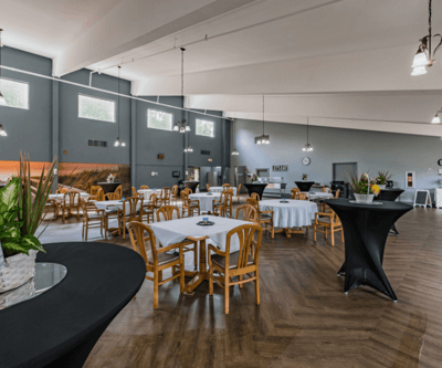 Bright dining area with tables set up for residents