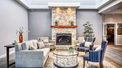 Cozy common area with seating and a fireplace
