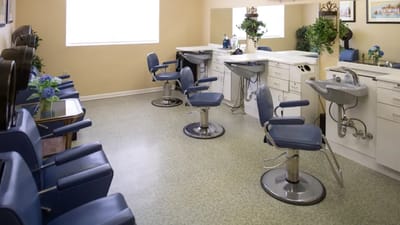 Interior view of a salon area with styling stations