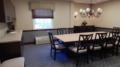 Bright dining room with large table and chairs