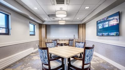 Bright interior room with tables and chairs