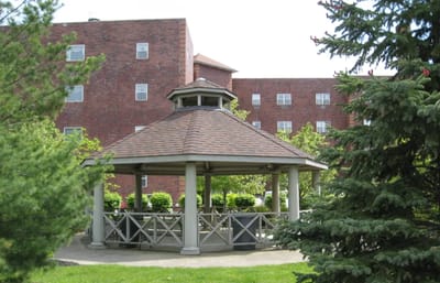 Gazebo in a landscaped outdoor area of the facility