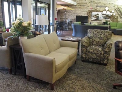 Cozy seating area with floral decor in a common space