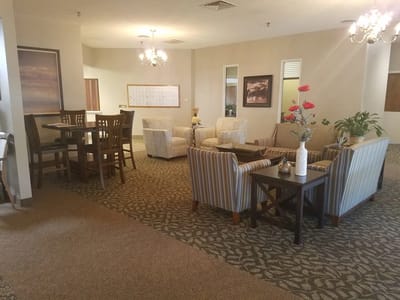 Common area with seating and tables in a retirement village