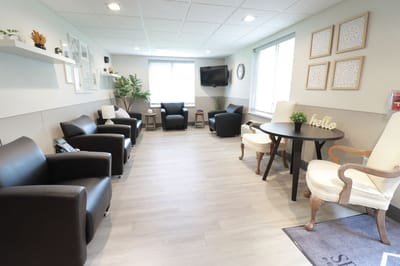 Bright common area with seating and decor