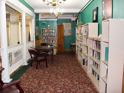 Interior view of a cozy library with bookshelves