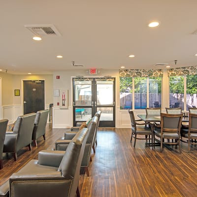 Interior of a common area with seating and natural light