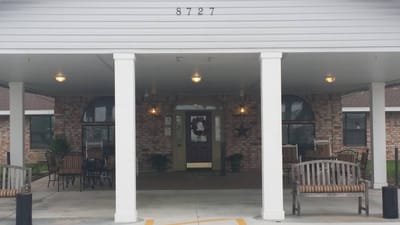 Exterior view of the front entrance of a nursing home