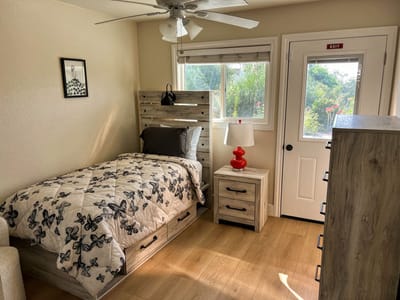 Cozy resident room with a bed and furniture