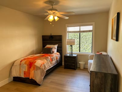 Cozy private bedroom in a senior living facility