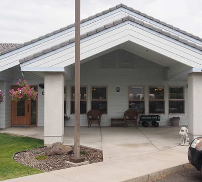 Exterior view of Chandler House entrance with seating area