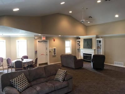 Interior lounge area with seating and fireplace