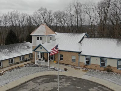 Aerial view of the facility building with snow